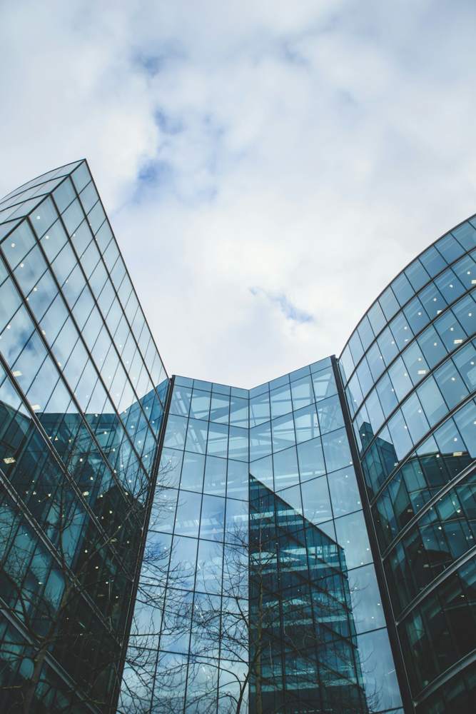 Glass office towers seen from below